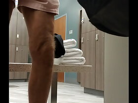 into yoga clothes in the locker room.