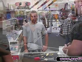 Hot guy strips in pawn shop and sucks cock