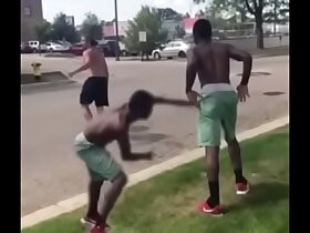 Two big boys slap each other